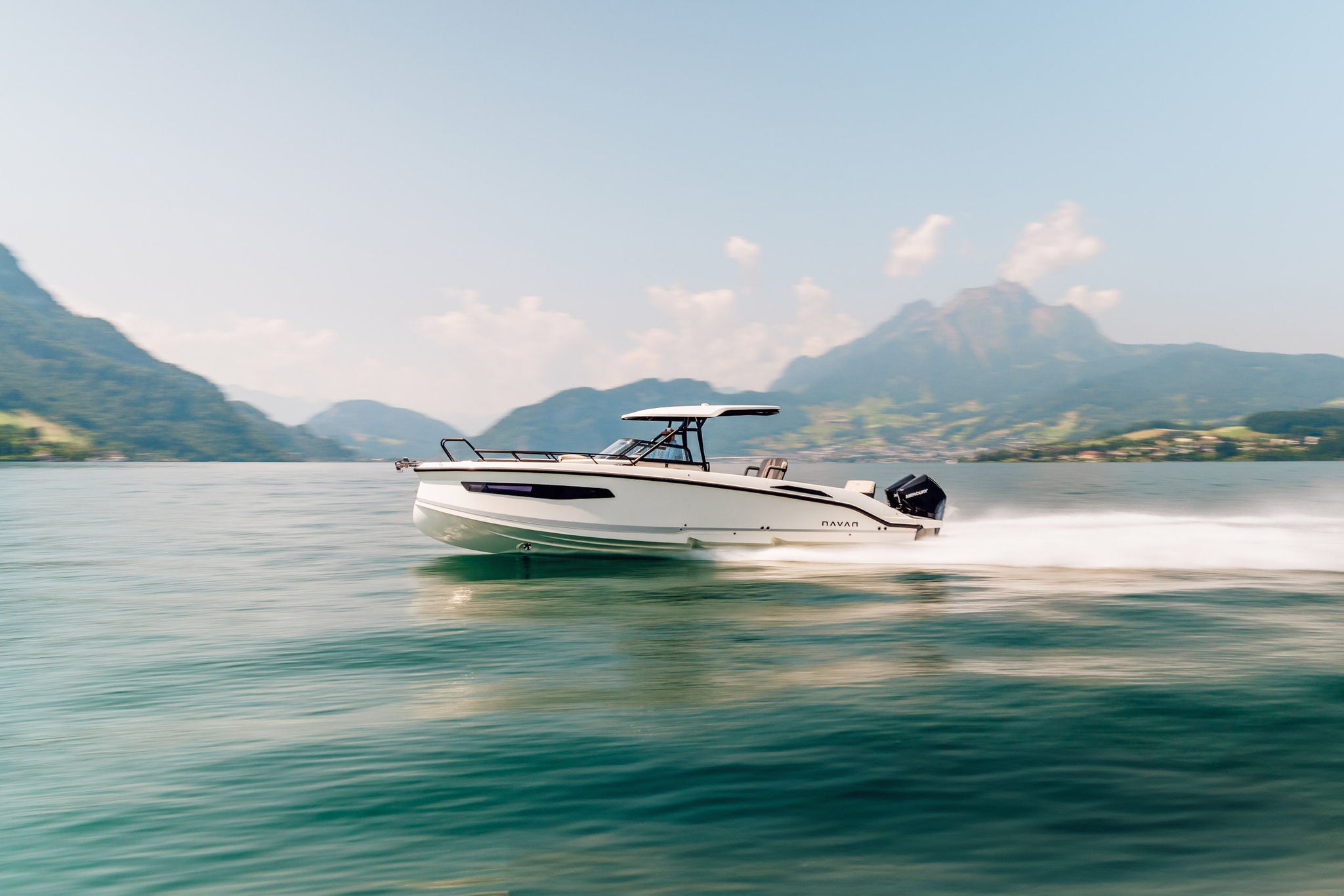 NAVAN S30 on the open water with mountians in the background