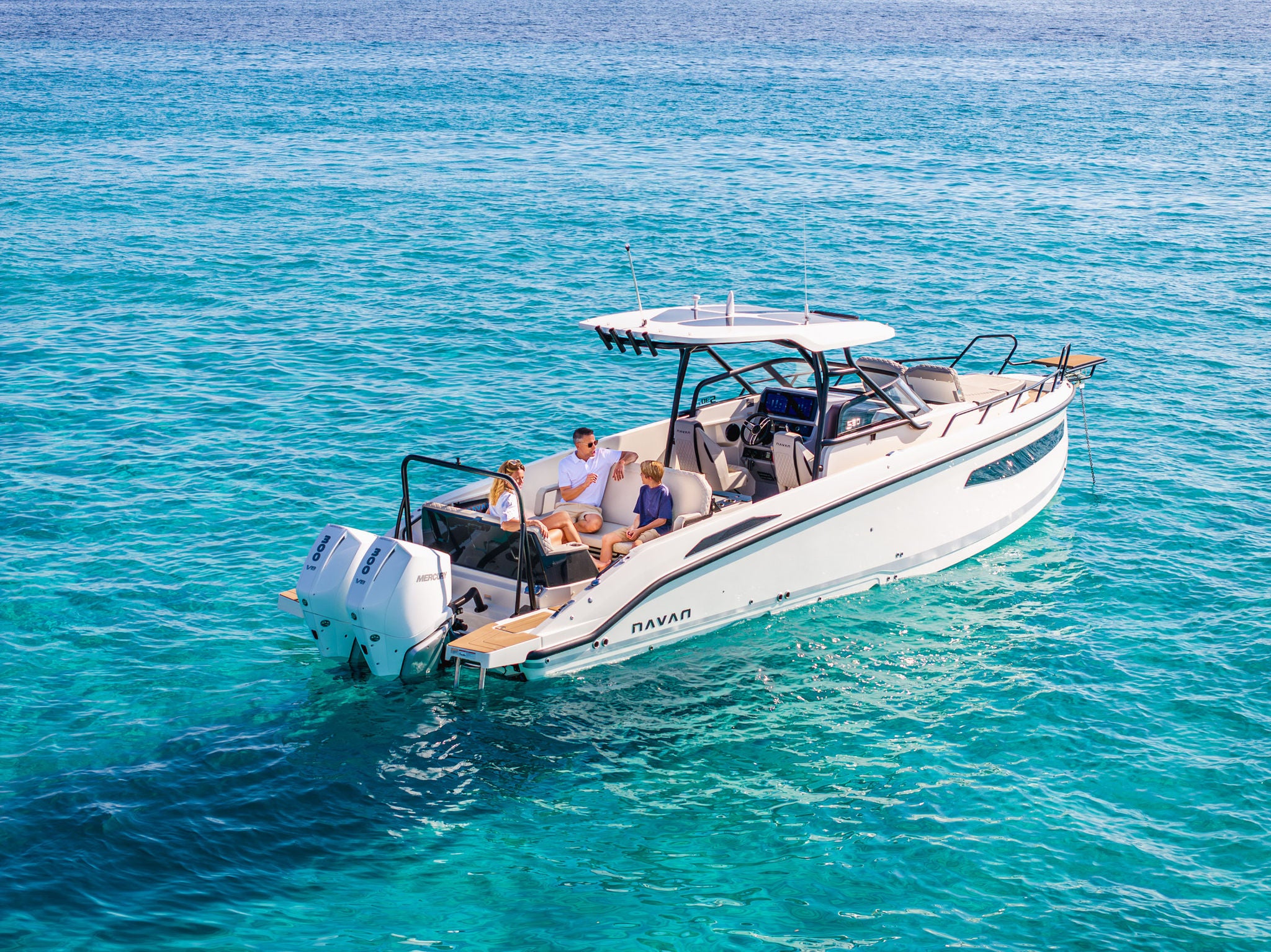 A NAVAN S30 at anchor on clear blue waters